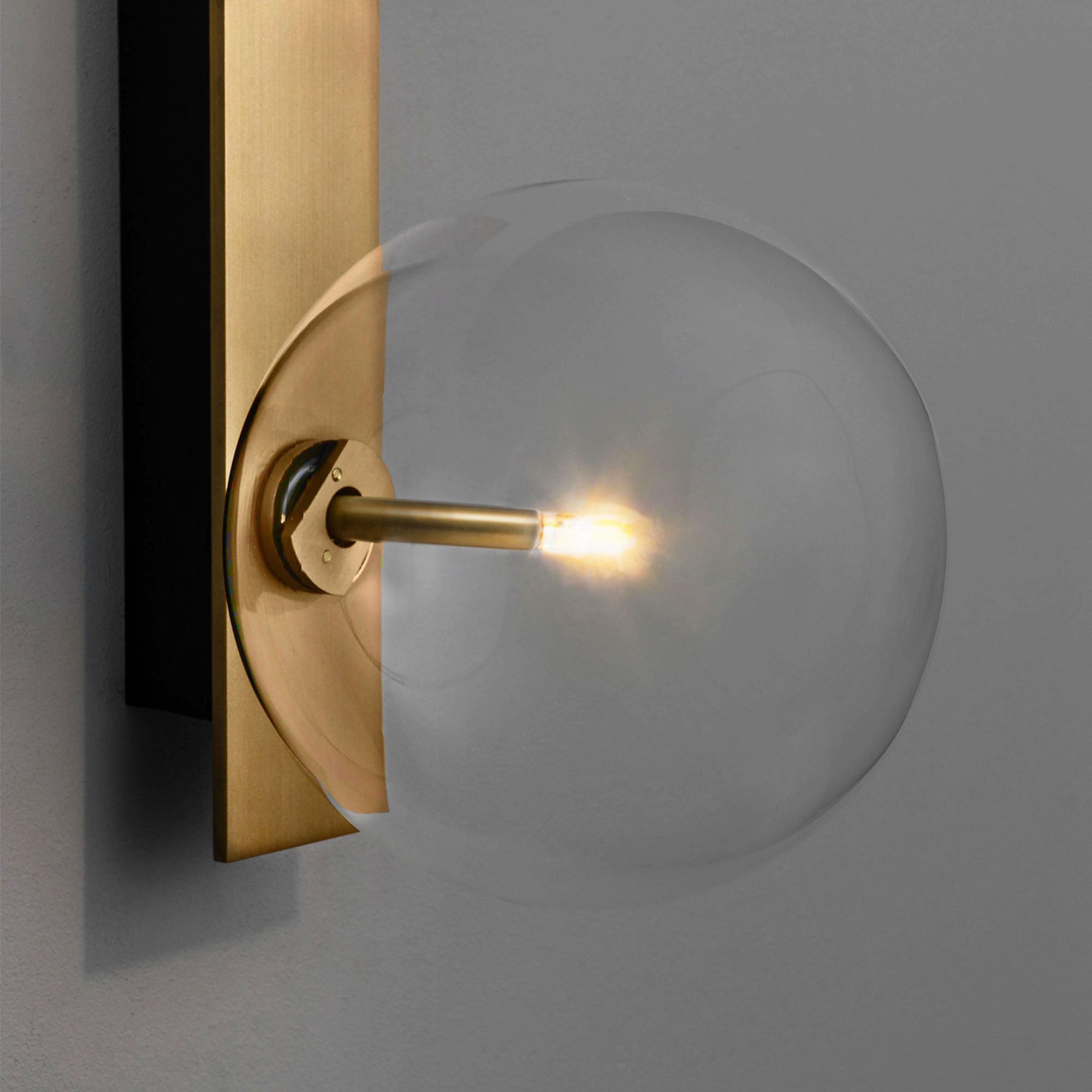 Schwung Oslo Triple Burnished Brass Transparent Globe Wall Light